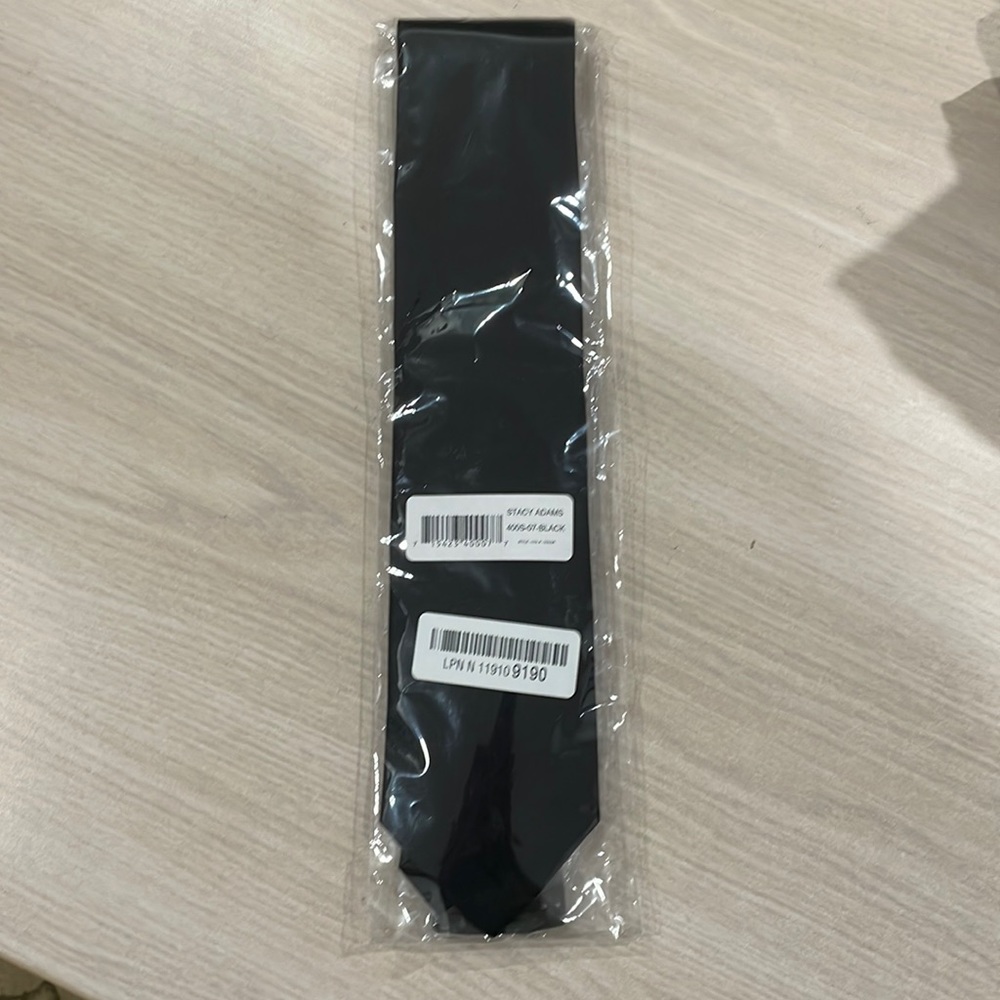 Stacy Adam’s black tie and pocket square